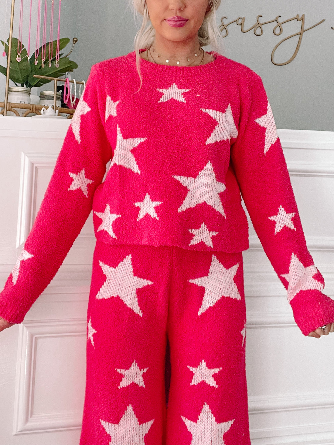 Hot pink Cuddle in the Clouds pants set with white star pattern.
