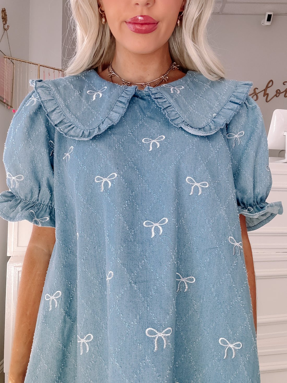Light blue denim dress with embroidered bows and a ruffled Peter Pan collar - Denim Doll Dress from Sassy Shortcake
