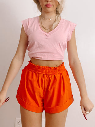 WHS #18 bright orange shorts, cuffed hem, elastic waistband
