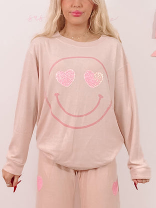 Pink sparkly heart smiley face pajama set; comfy lounge pants & sweatshirt.
