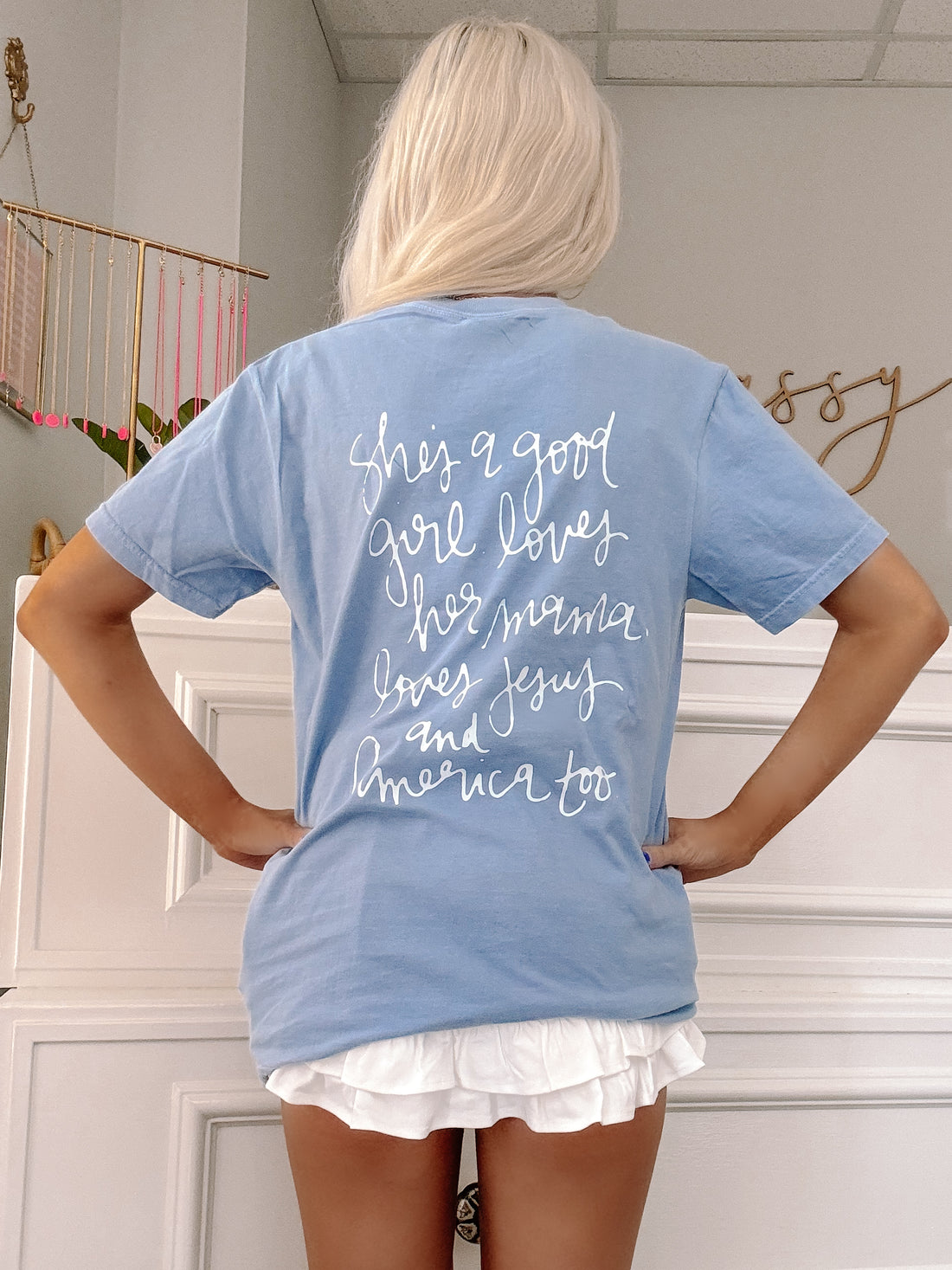Oversized fit blue tee styled for casual summer holidays.