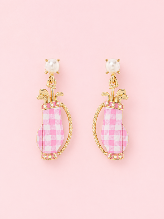 Par-Tee in Pink Earrings from Sassy Shortcake: Pink color coated golf bag earrings with gold metal details, faux pearl studs, and tiny golf club accents on a light pink background.