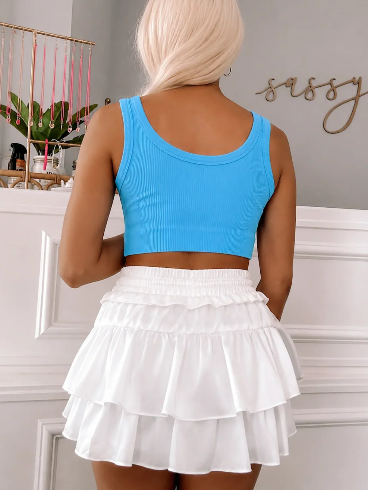 Blue Ribbed On The Way Top from Sassy Shortcake paired with a white skirt, showcasing the soft ribbed texture and sporty everyday style.