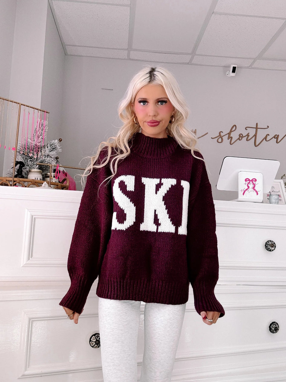 Après Ski Sweater - Sassy Shortcake - burgundy SKI graphic sweater front view on model