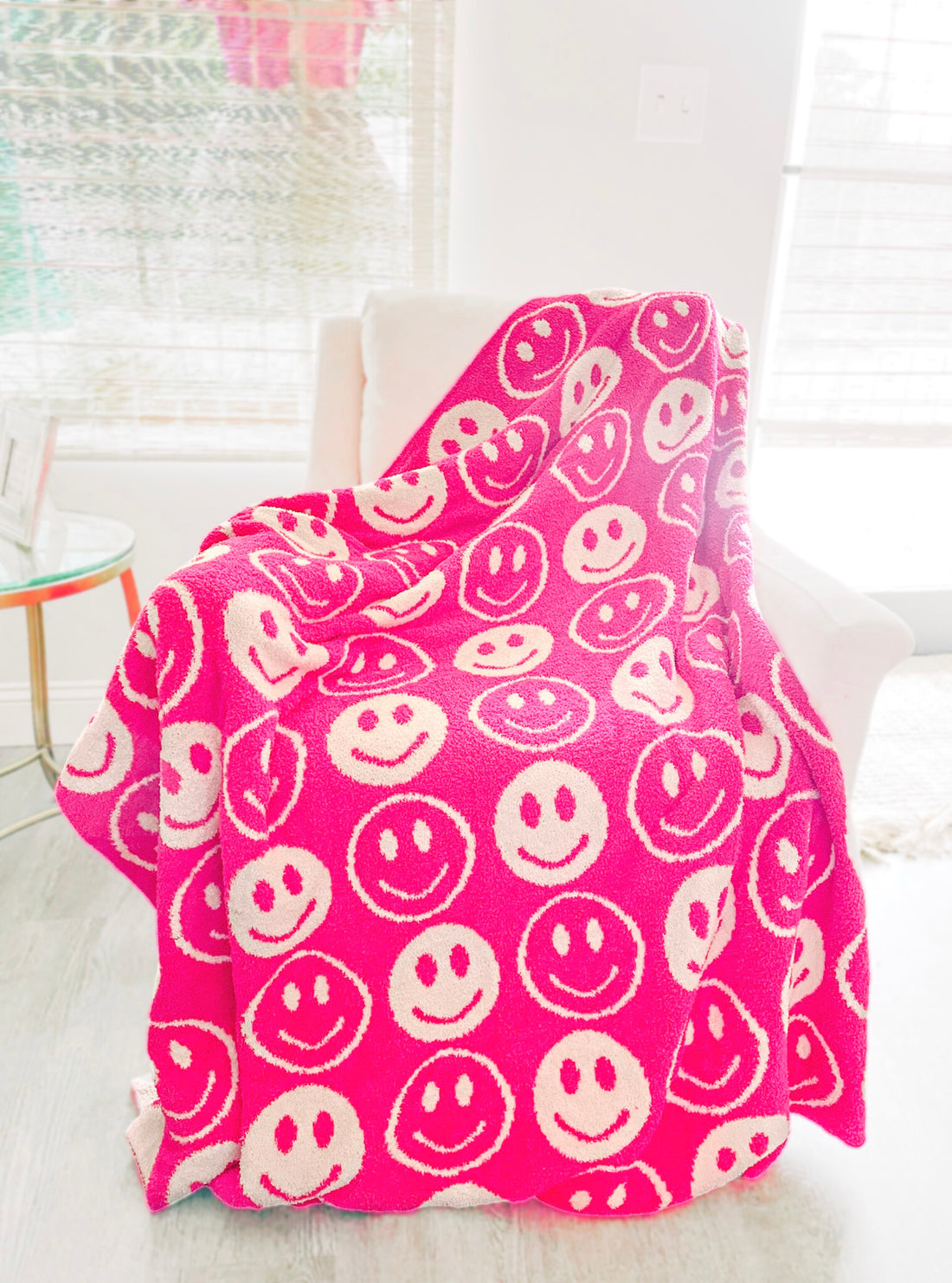 Smiley Dreams hot pink sherpa blanket with cream smiley faces
