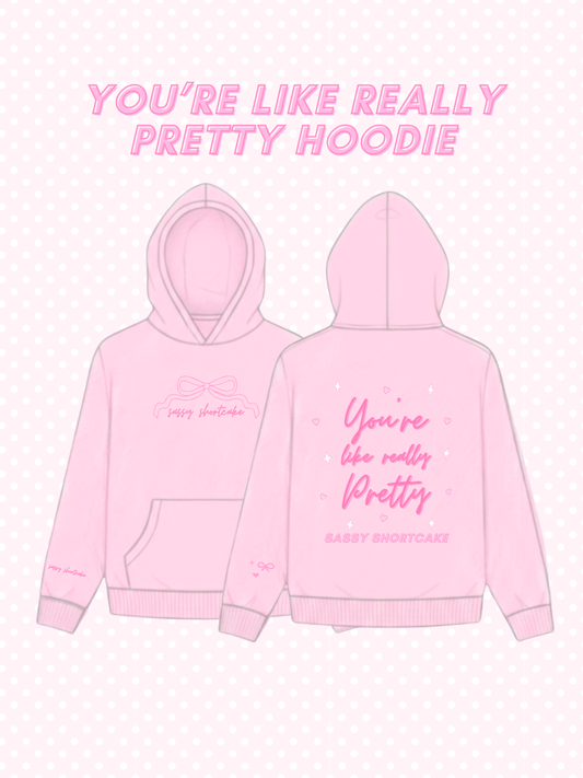 You're Like Really Pretty Hoodie from Sassy Shortcake - Pink hoodie with text on front and back on a white background