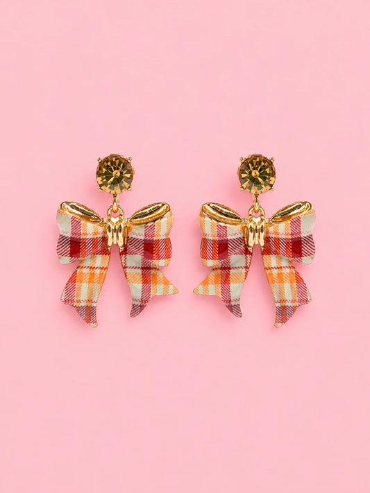 Apple Cider Bow Earrings from Sassy Shortcake, fall plaid bow drop earrings in orange, red, and cream with an amber crystal stud.