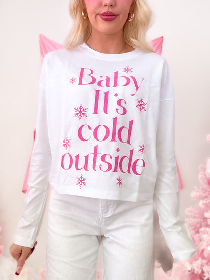 Sassy Shortcake Cold Outside Tee, a winter white t-shirt with "Baby It's Cold Outside" text and snowflakes in hot pink on the front.