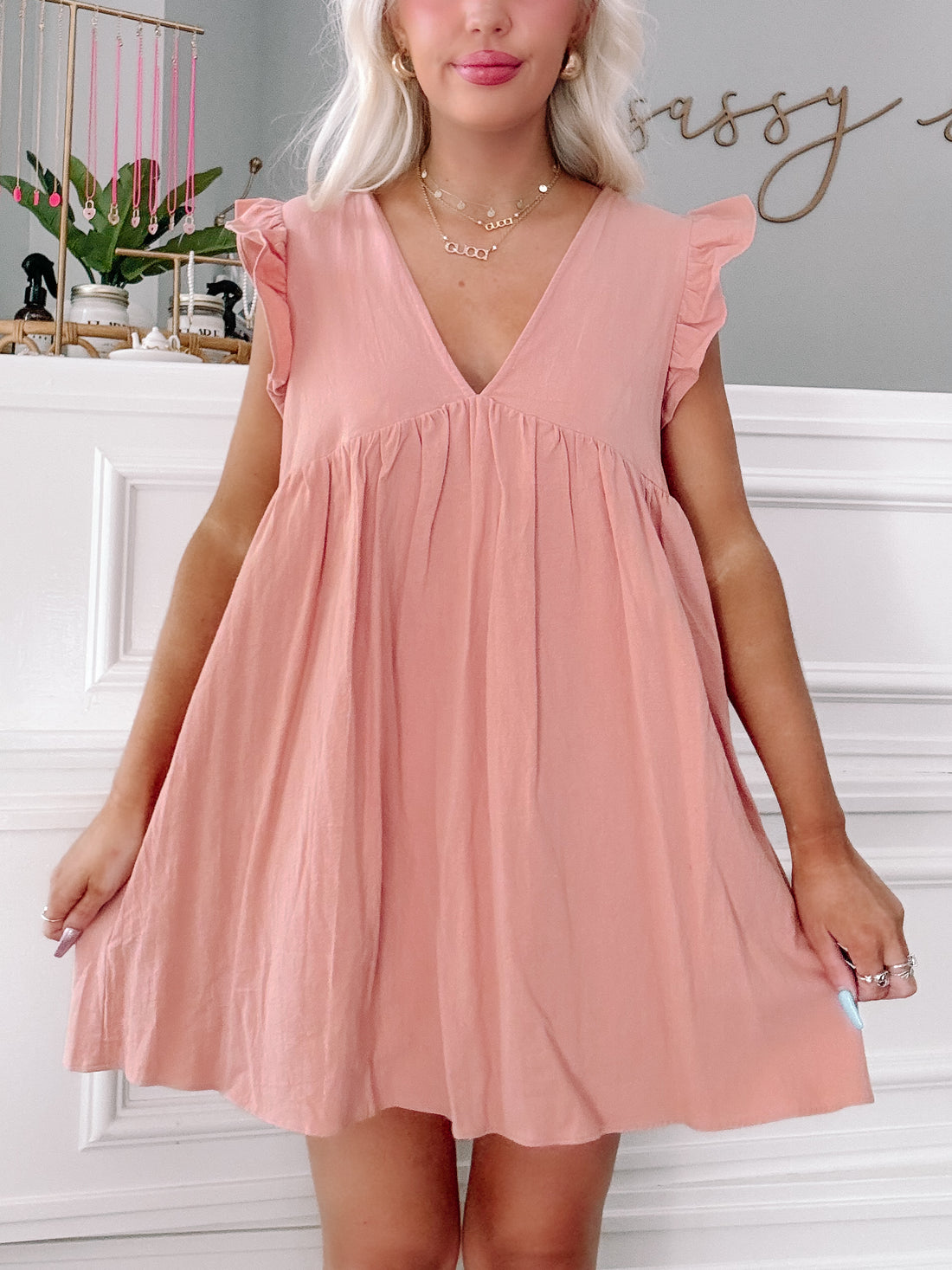 Bayside Breeze Dress in Spice: Pink mini dress with ruffle sleeves and V-neck.
