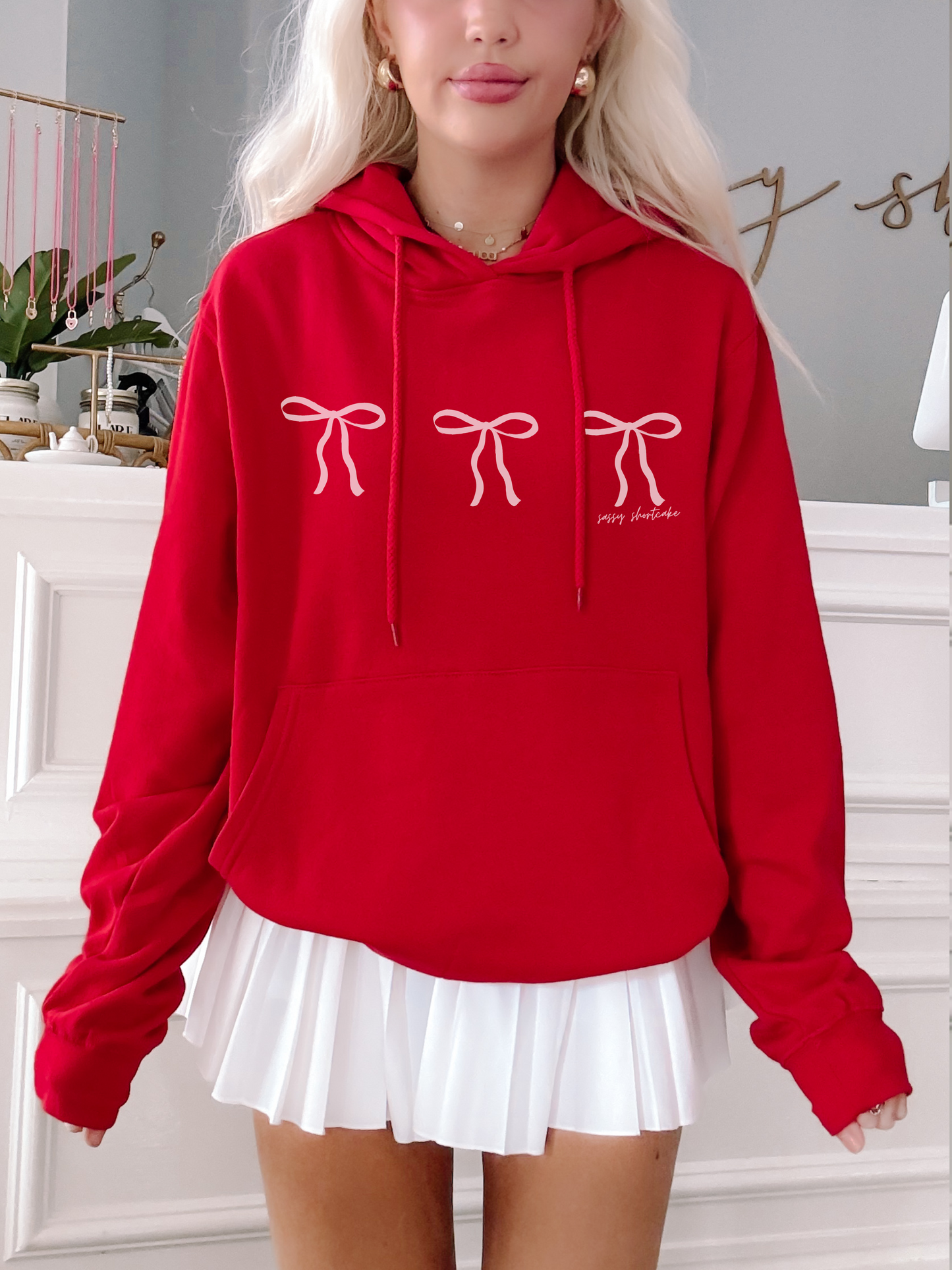 Red Blushing Bow Hoodie with three pink bows, from Sassy Shortcake.
