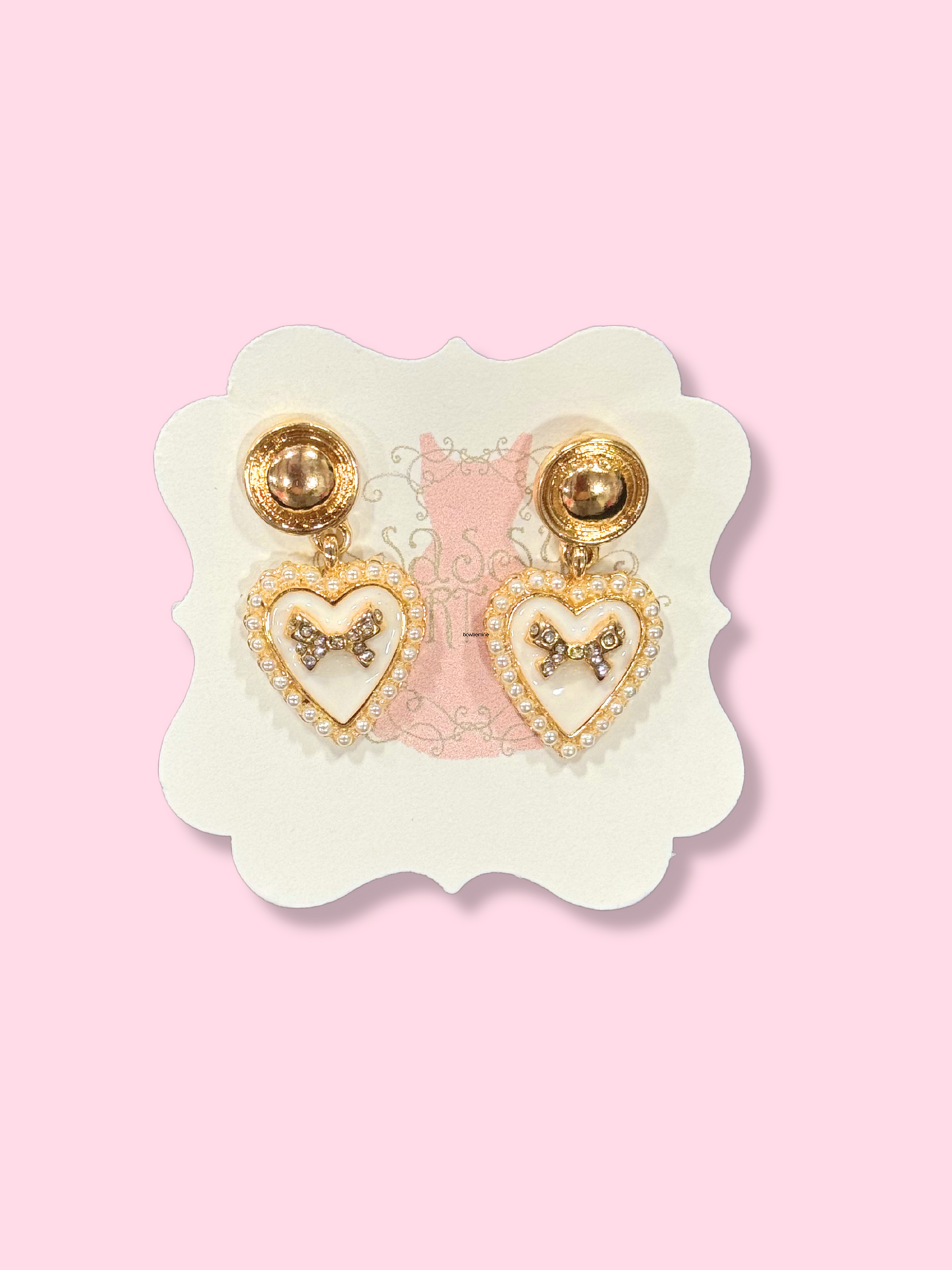 Bow be Mine heart earrings with gold accents and pearl detailing
