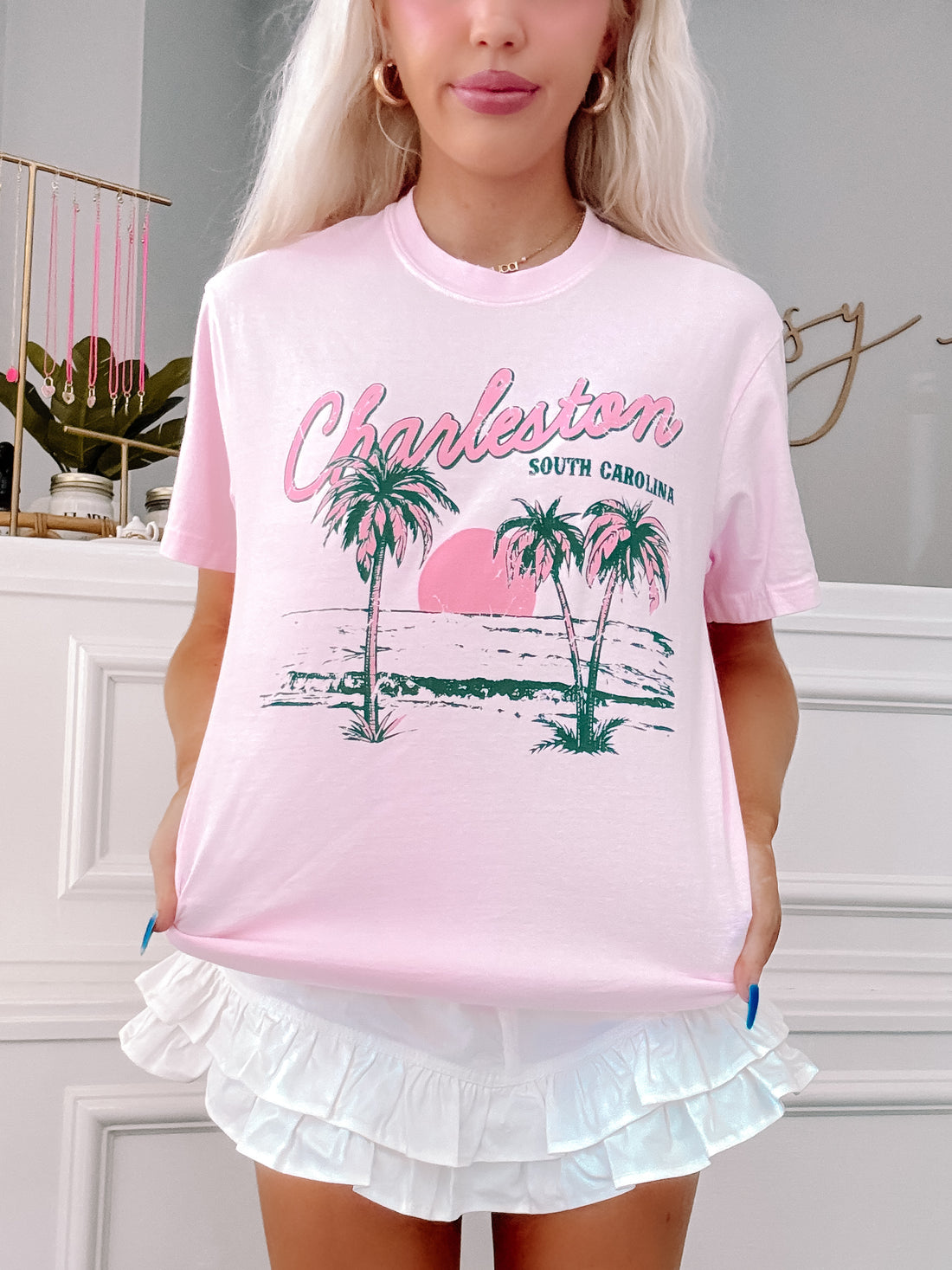 Preppy pink tee featuring “Charleston South Carolina” text and summer vibes.