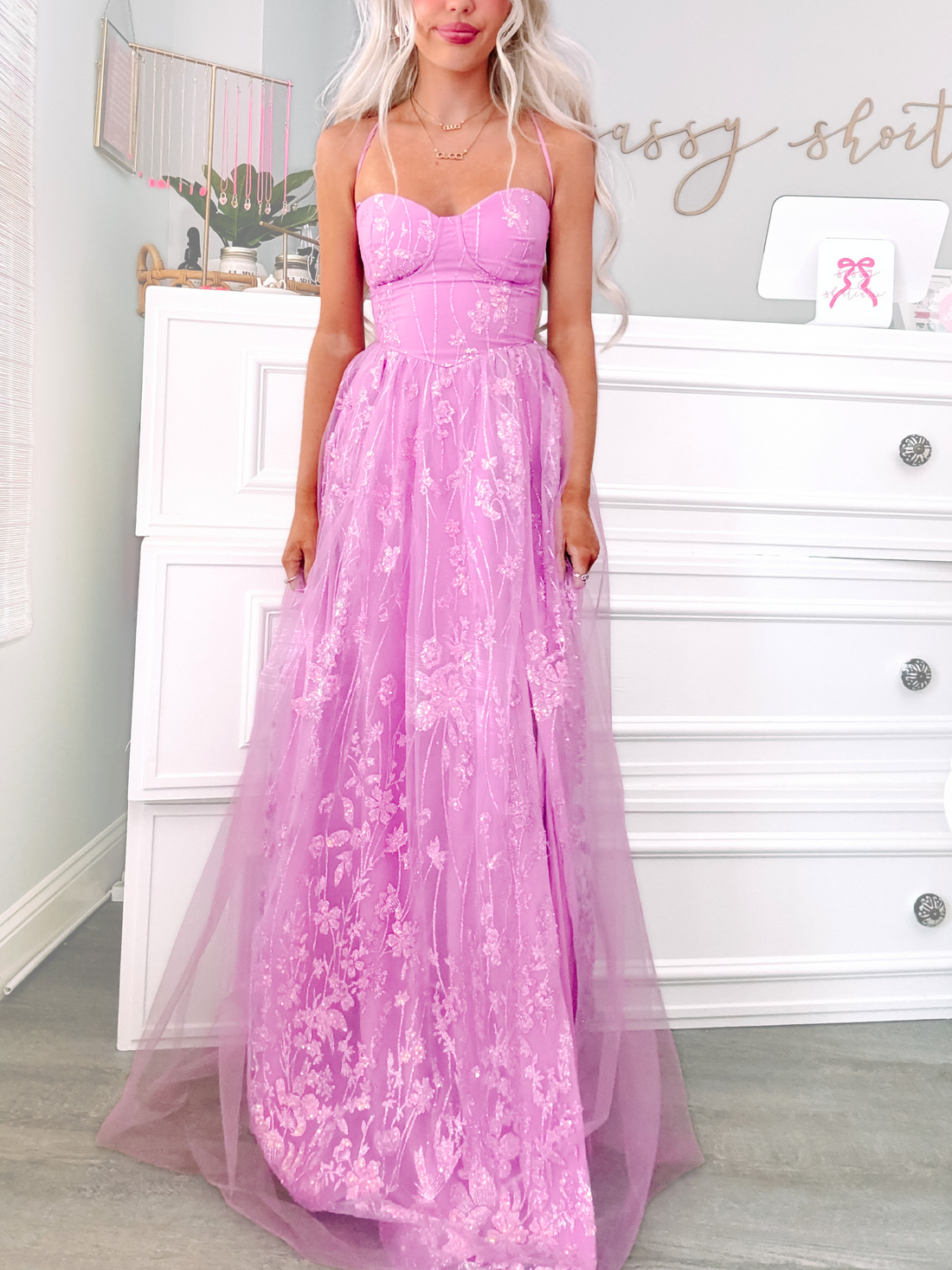 Side view of lilac strapless tulle maxi dress with layered skirt and soft flowing train from Sassy Shortcake