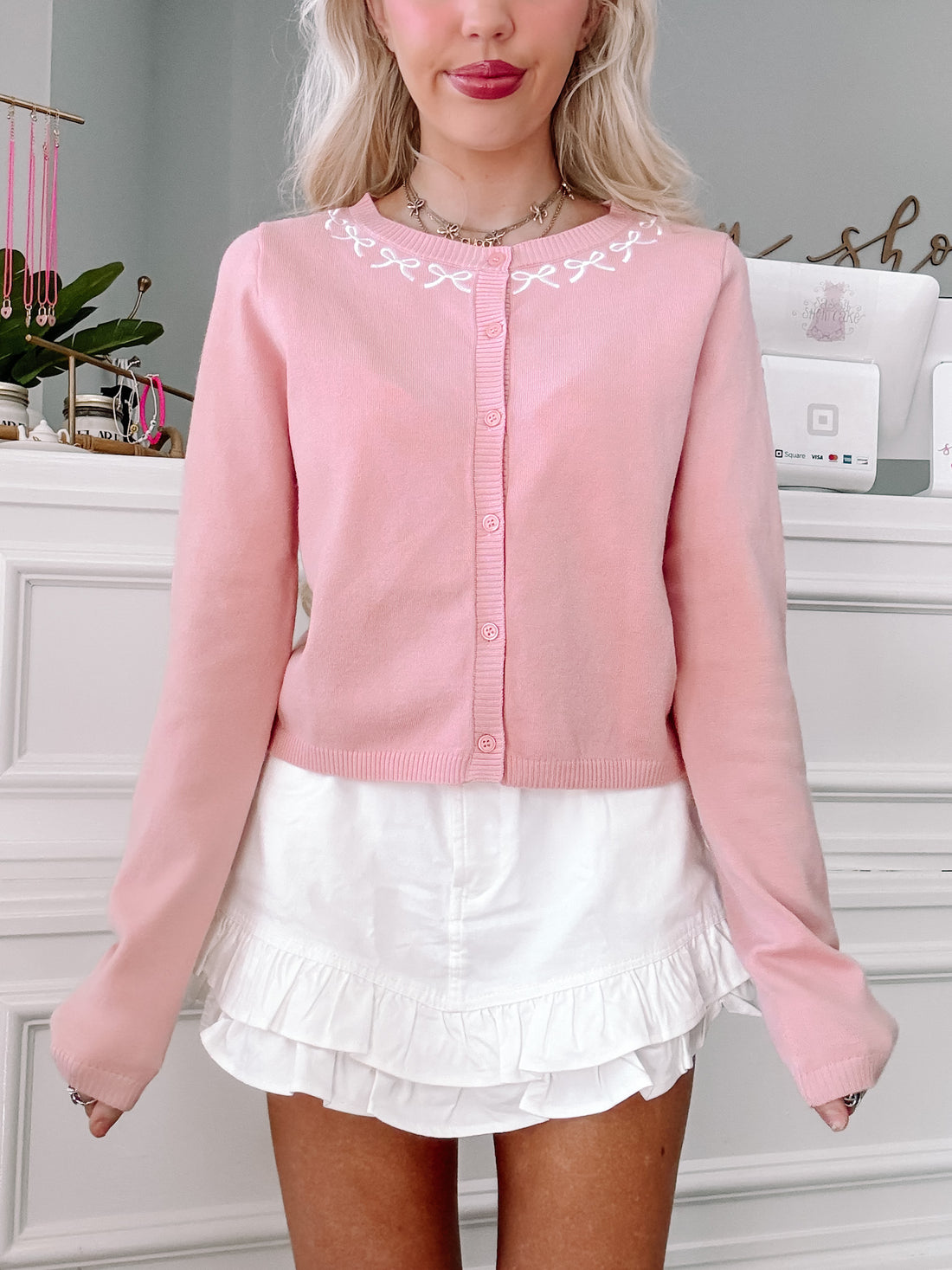 Pink Everbow cardigan with embroidered neckline detail
