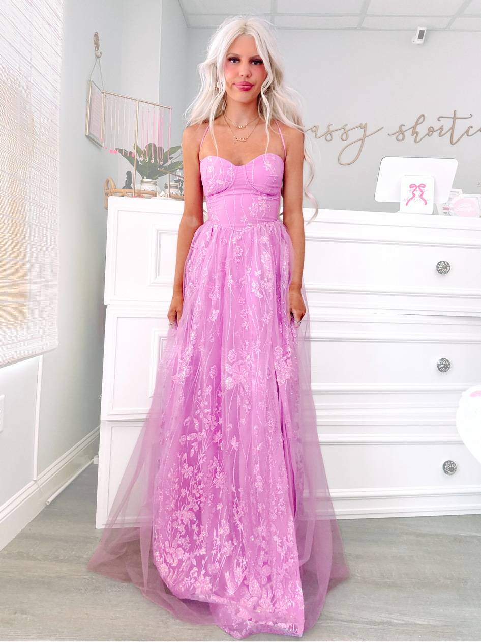 Enchanted Maxi Dress in blush pink with sheer ruffled layers, strapless bodice, and romantic silhouette from sassy shortcake