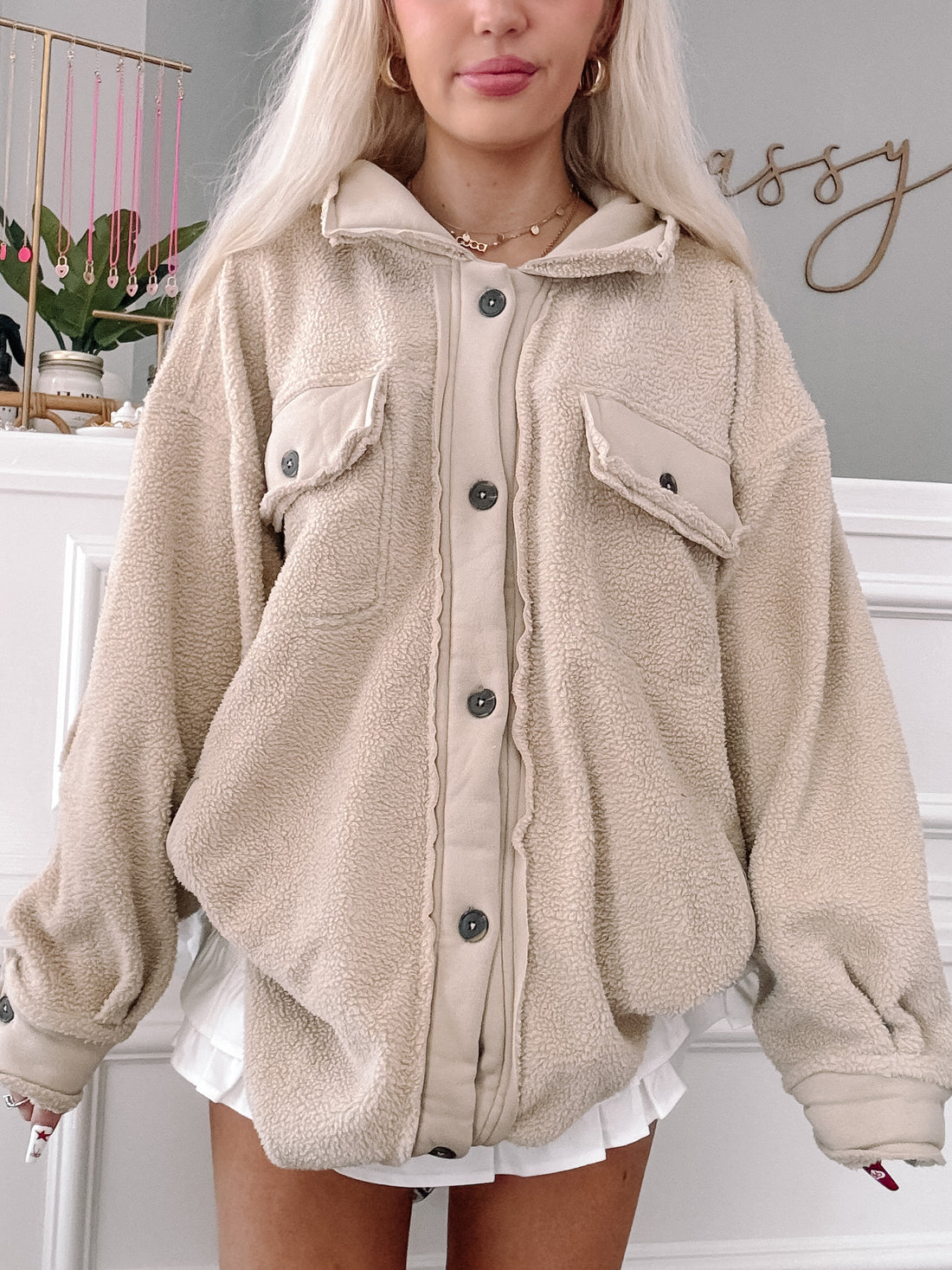Fuzzy Forrest Shacket in Birch: Cozy beige sherpa fleece shacket with button front and pockets.
