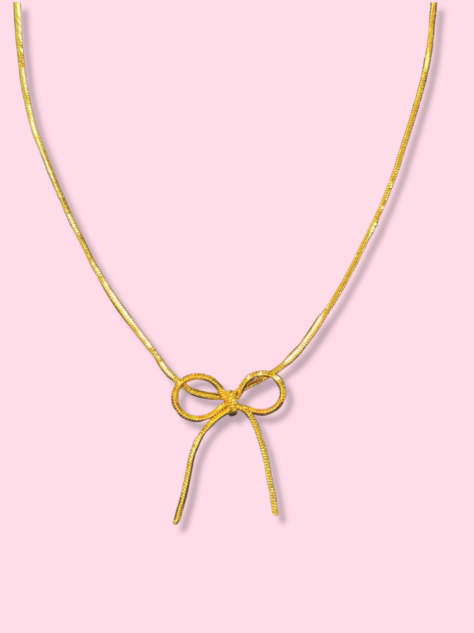 Gold Golden Knot Bow Necklace, delicate gold chain with a charming bow detail.
