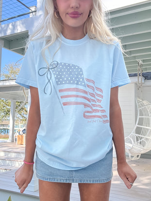 Patriotic graphic tee styled for summer events or casual everyday wear