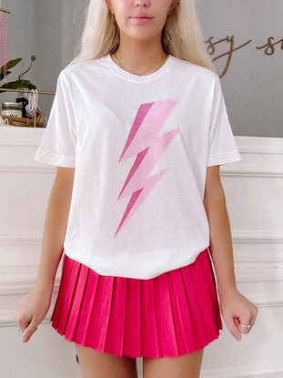 White Lightning Bolt Tee featuring a pink ombre graphic.
