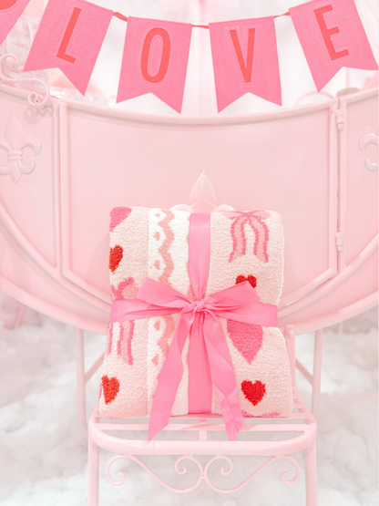 Love Bow Blanket Sassy Shortcake – rolled microfiber throw blanket with pink ribbon bow styled in pink room