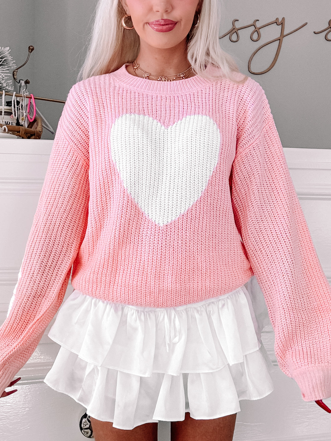 Pink Love in Loops sweater with large white heart detail
