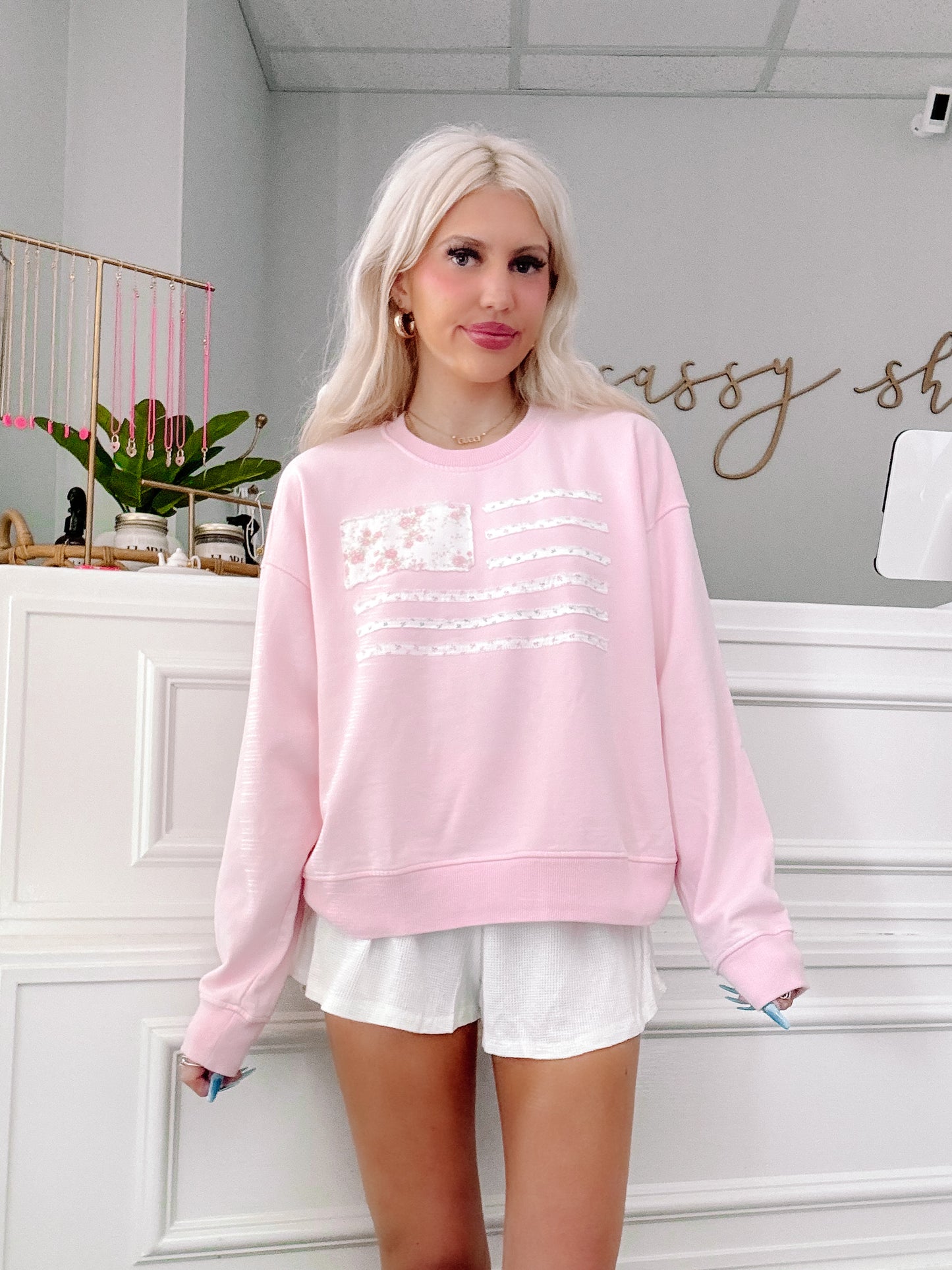 Model wearing Sassy Shortcake with American flag patchwork detail