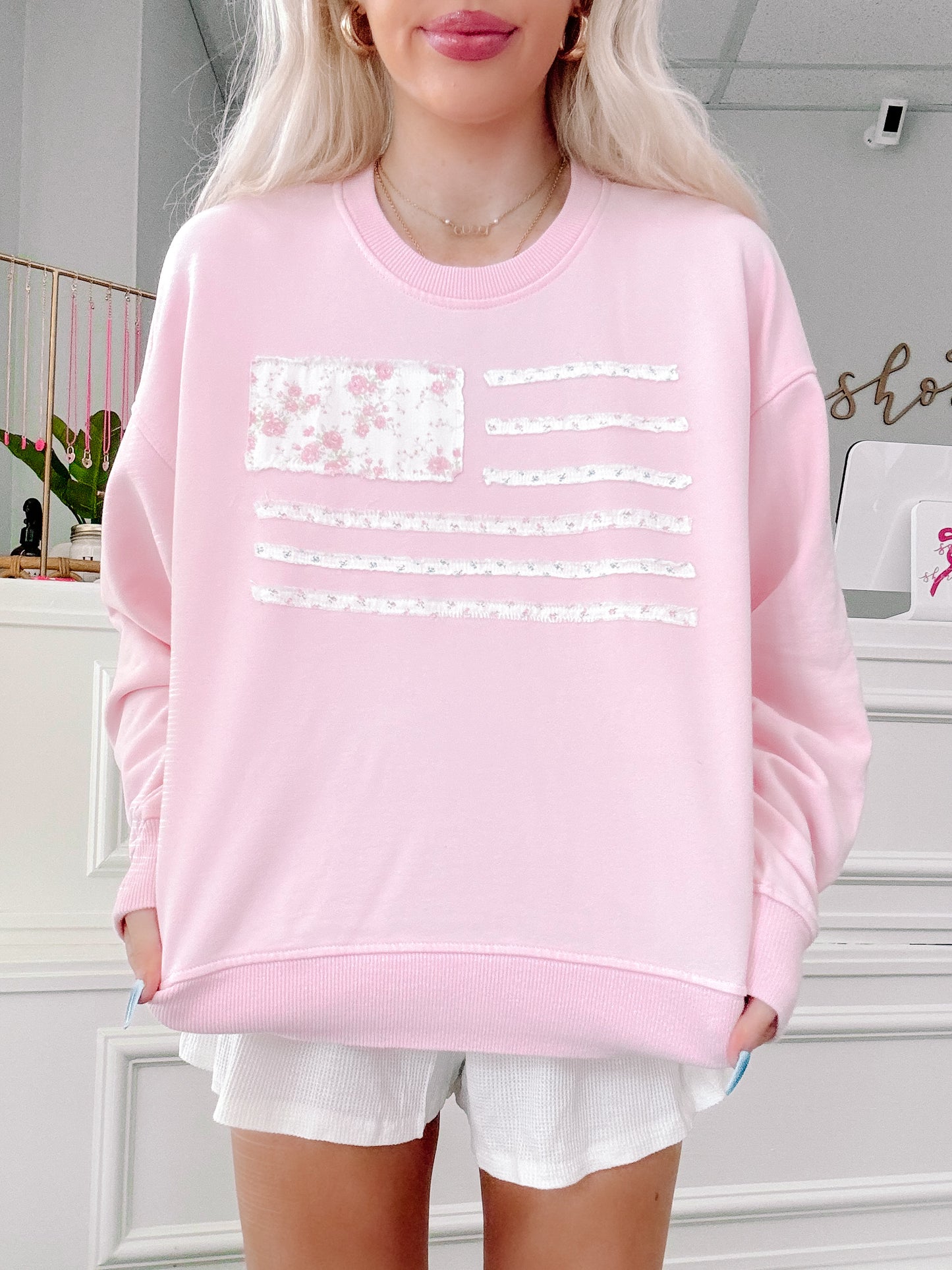 Model styling pink Patriotic Patchwork crewneck in summer look