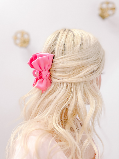 Pink Satin Bow Hair Clip from Sassy Shortcake – pink satin bow clipped into half-up hair back view