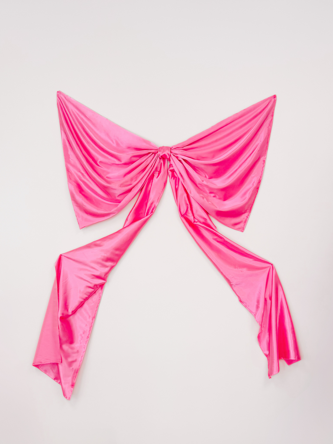 Pink Coquette Wall Bow:  Large hot pink satin bow for wall decor, adds a touch of elegance to any room.

