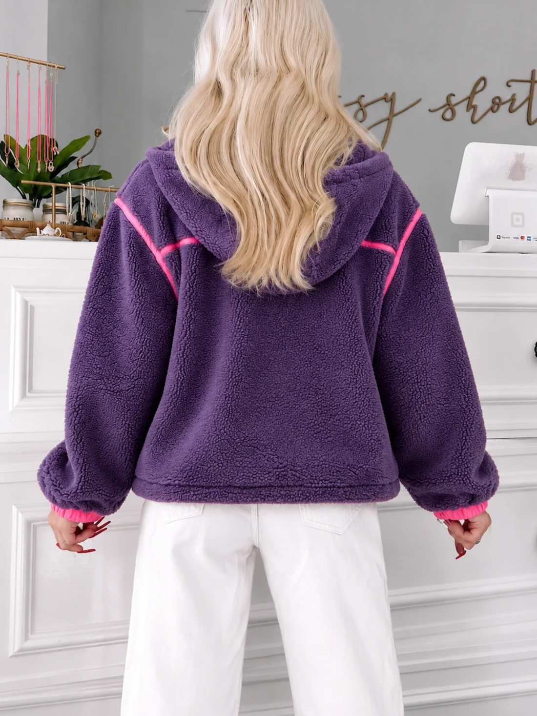 Back View of the Plum Pretty Pullover featuring plush purple sherpa fleece, hot pink trim, hood and cozy front pocket details from Sassy Shortcake