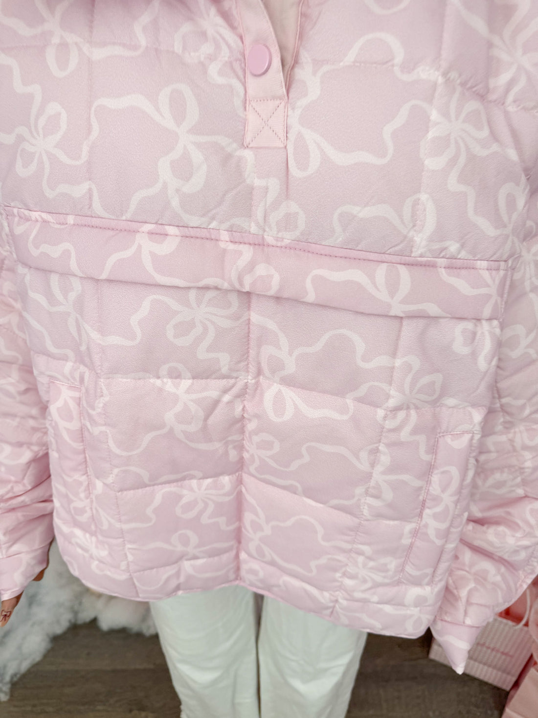 Sassy Shortcake Presley Bow Pullover detail—pink quilted fabric with delicate bow pattern