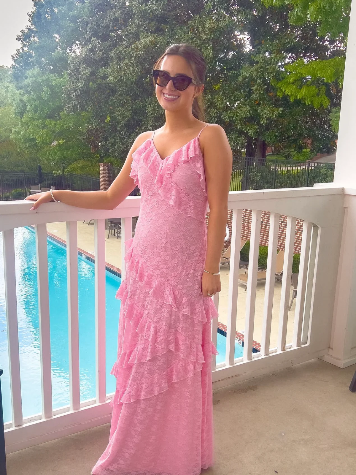 Pretty in Pink Lace Dress from Sassy Shortcake featuring a pink lace overlay, adjustable spaghetti straps, sweetheart neckline, and cascading tiered ruffle maxi skirt.
