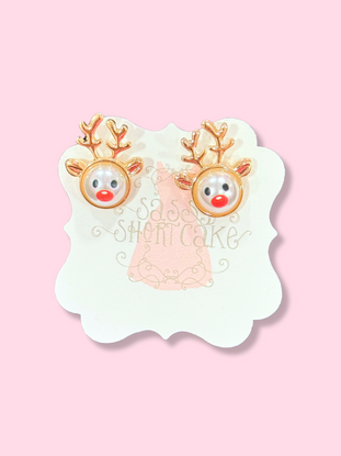 Adorable reindeer pearl earrings with gold antlers and red noses.
