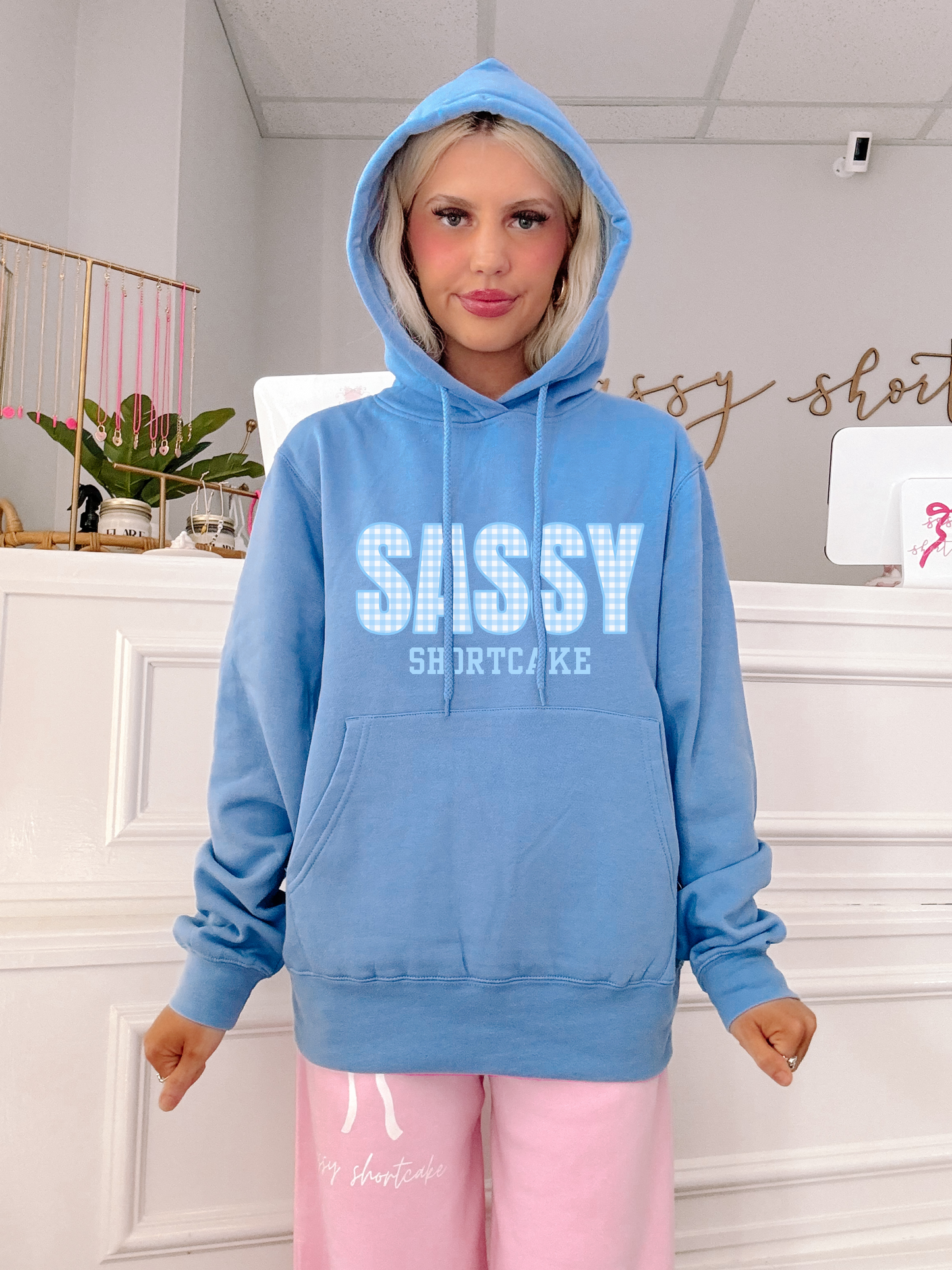 model wearing sassy shortcake blue gingham hoodie