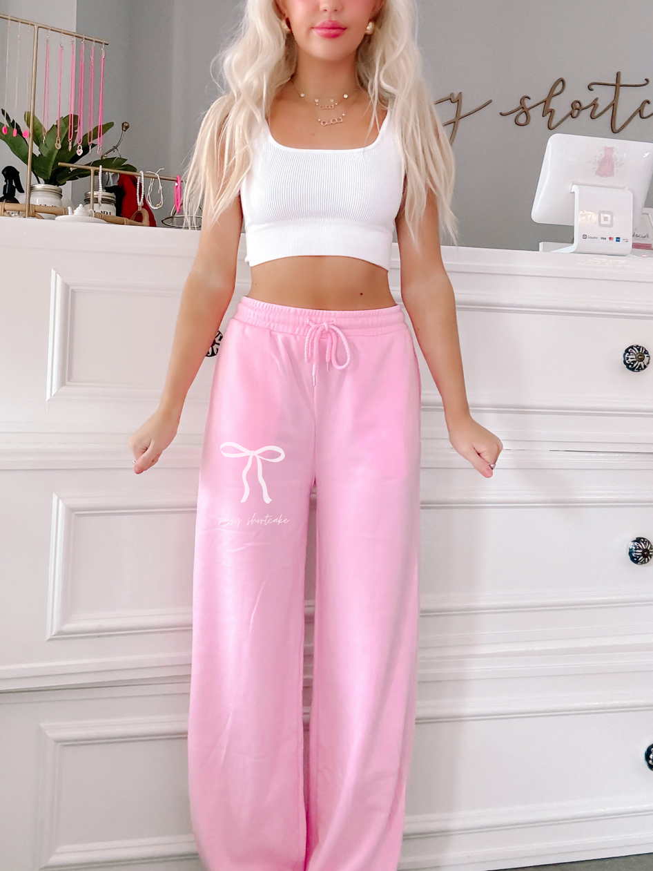 Bubblegum pink Sassy Shortcake wide-leg sweatpants with bow detail
