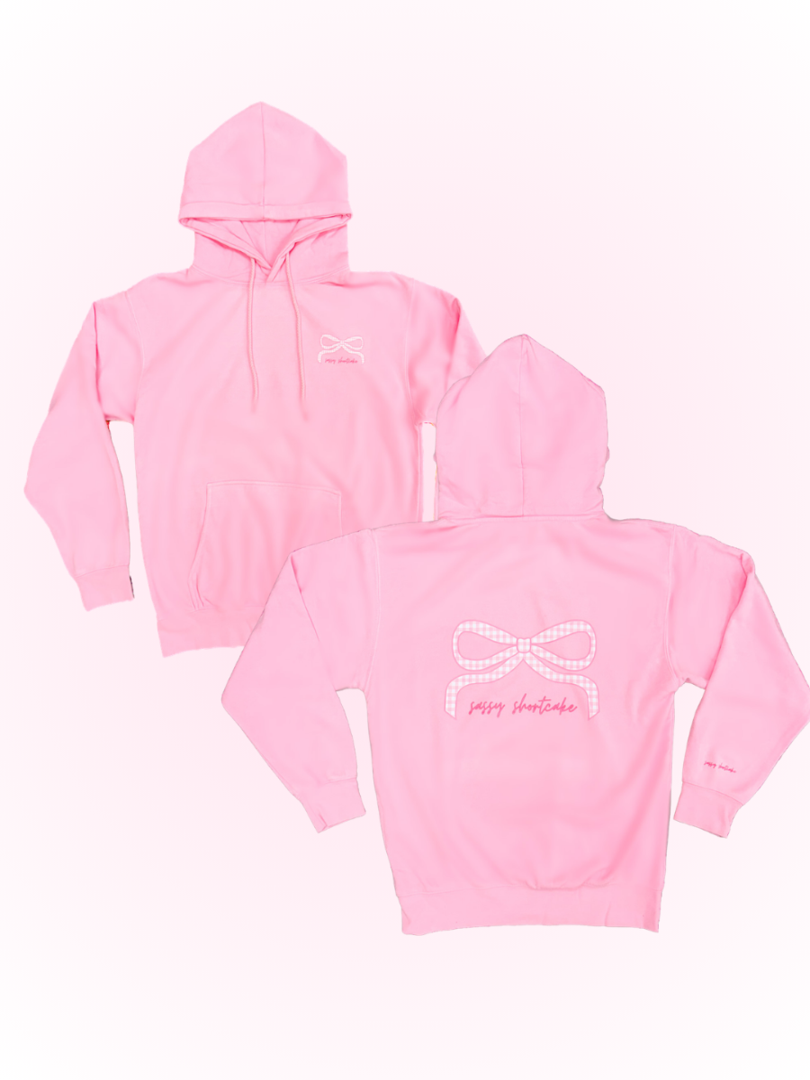 Sassy Gingham Bow Hoodie from Sassy Shortcake - Two pink hoodies with a logo and text on a white background