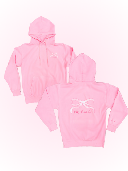 Sassy Gingham Bow Hoodie from Sassy Shortcake - Two pink hoodies with a logo and text on a white background