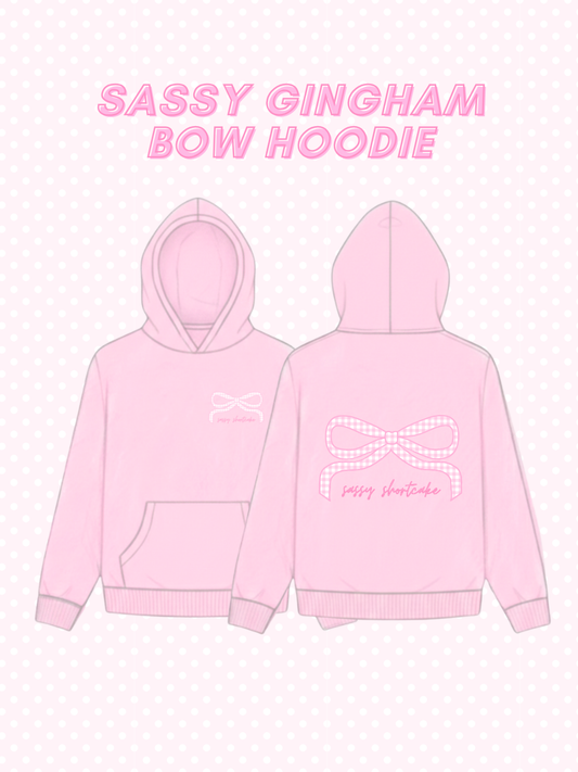 Sassy Gingham Bow Hoodie from Sassy Shortcake - Pink hoodie with 'Sassy Gingham Bow Hoodie' text on a white background