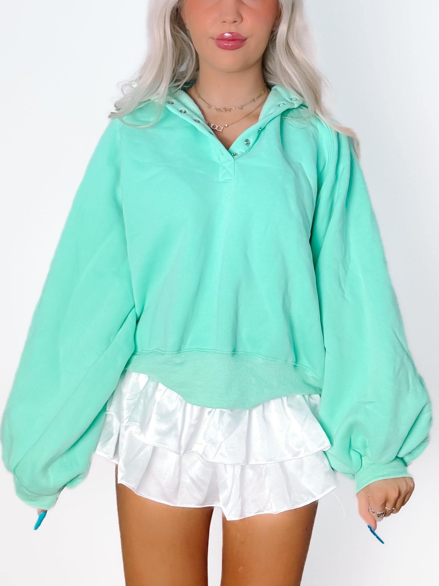 Seafoam Brynn Pullover Top: Cropped, oversized mint green sweatshirt with snap button detail.
