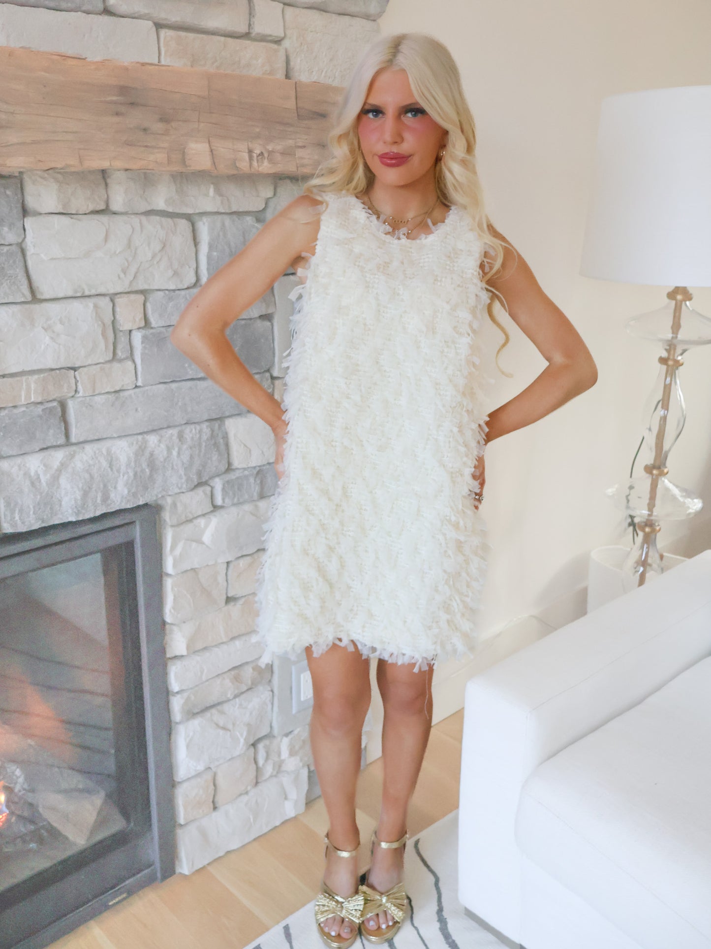 Detail shot of Sassy Shortcake Snowfall Dress mini length and textured finish, chic white holiday dress for events.