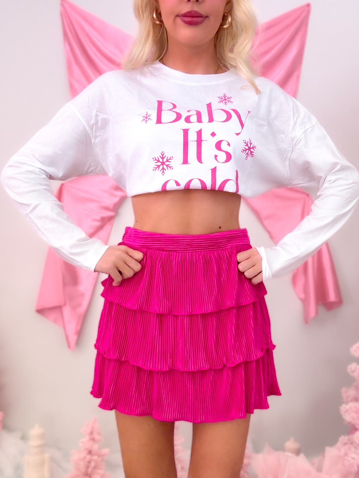 Shiny magenta satin skirt with layered ruffle details, modeled on figure from Sassy Shortcake's Soho collection.