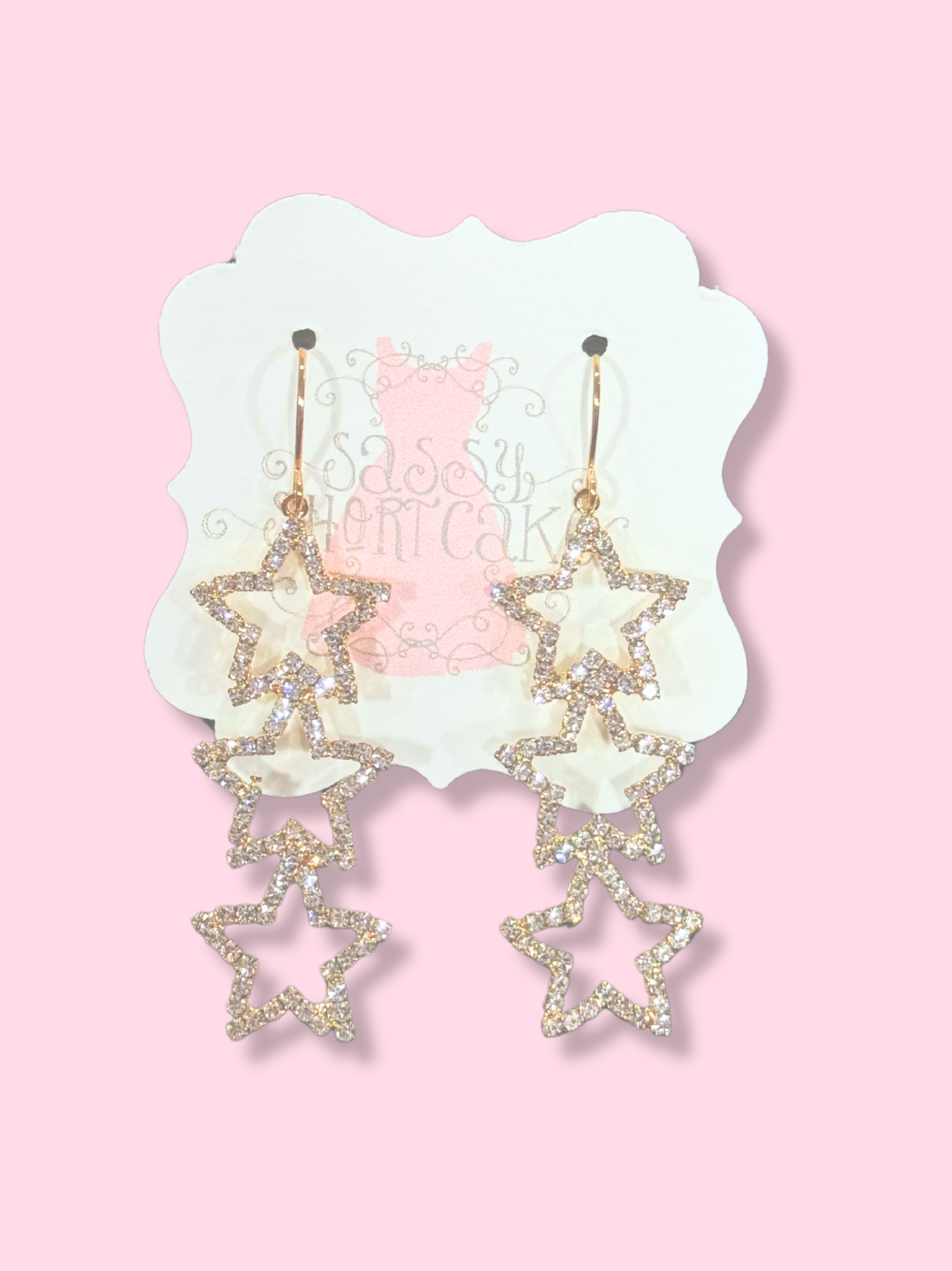 Sassy Heartcake Star Drop Earrings: Gold-tone, rhinestone-studded star design.
