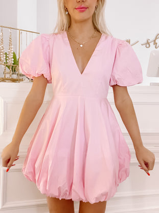 Pink Sugar Bubble mini dress with puff sleeves and V-neck.
