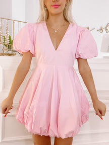 Pink Sugar Bubble mini dress with puff sleeves and V-neck.
