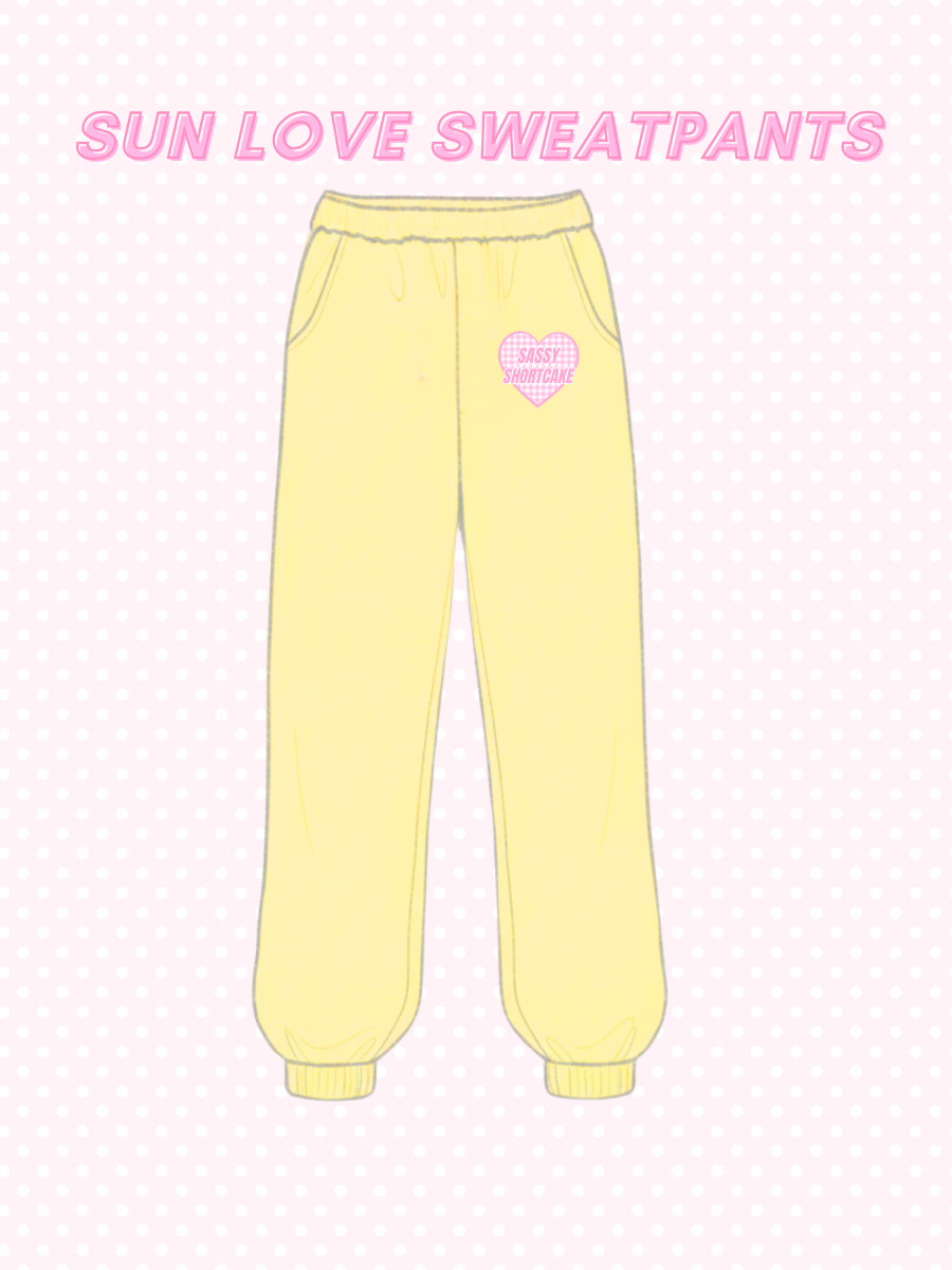 Sun Love Sweatpants from Sassy Shortcake - Yellow sweatpants with a pink heart on a light pink background