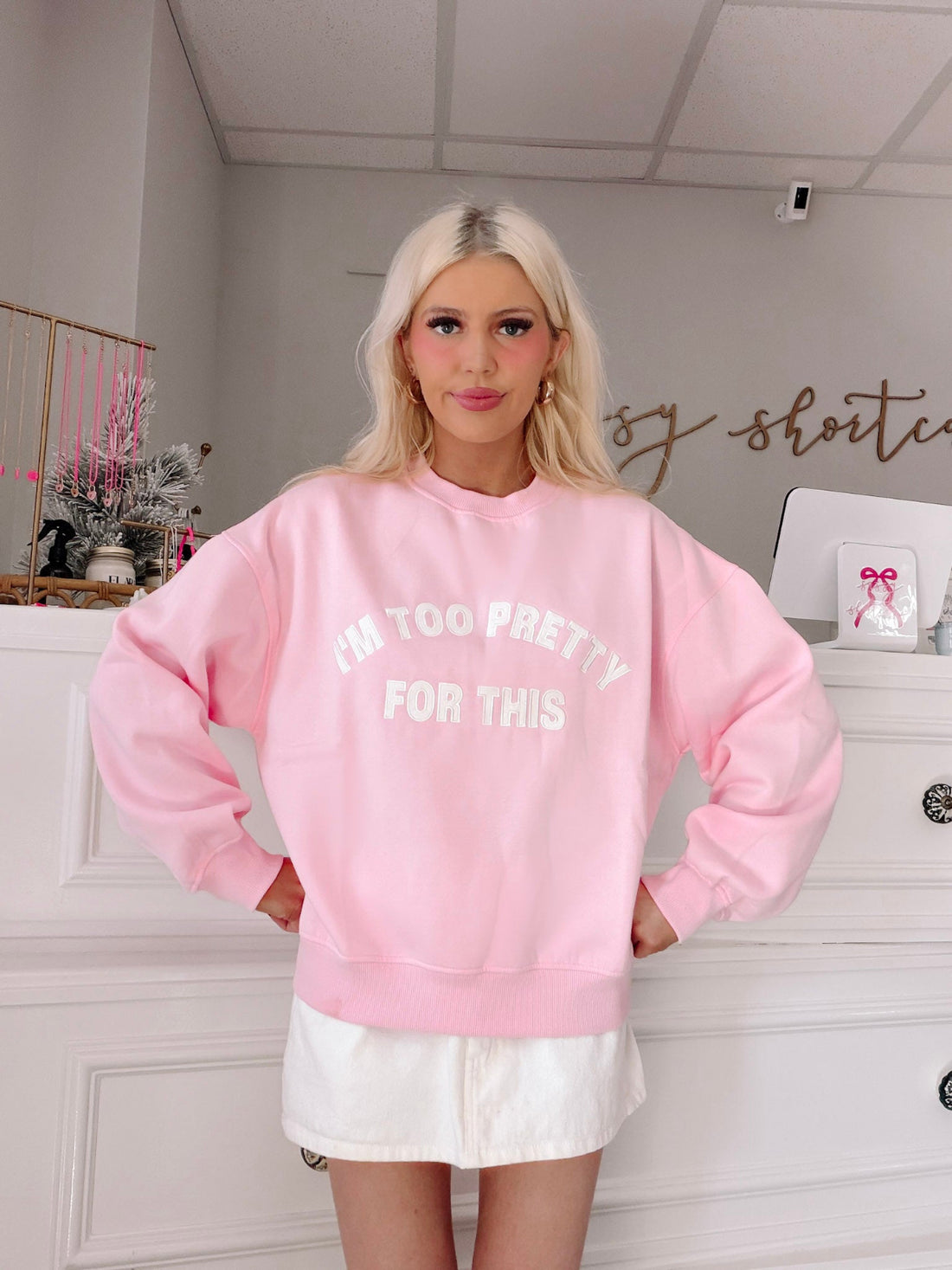 I'm Too Pretty For This Pink Crewneck from Sassy Shortcake - woman wearing a pink sweatshirt.