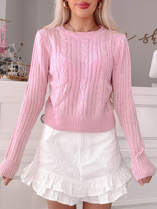 Pink cable knit Zina sweater with long sleeves
