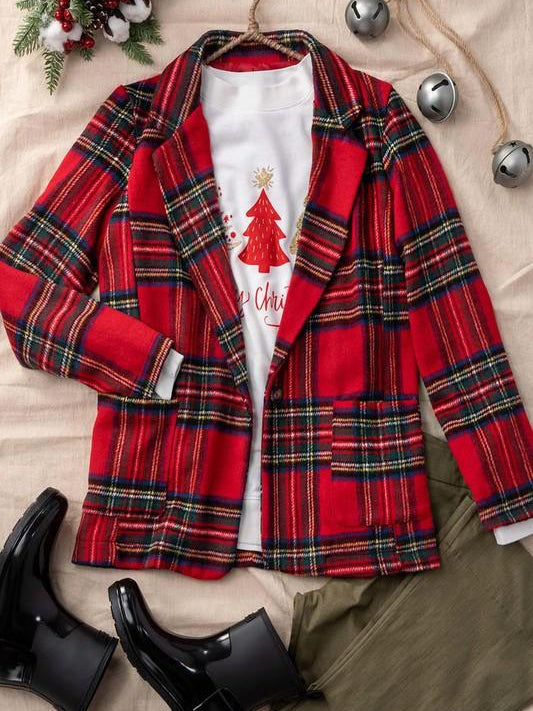 Red and green plaid blazer styled with olive green pants and black rain boots.
