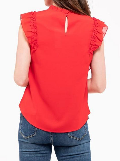 Red sleeveless ruffle top, back view, shown with jeans.
