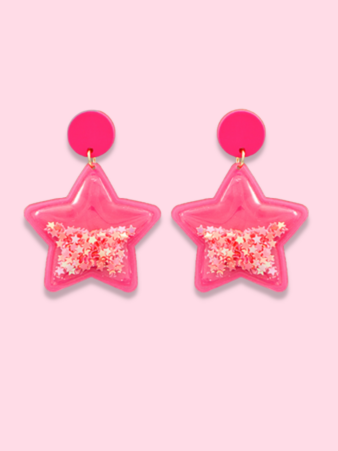 Pink star-shaped earrings with pink glitter inside.
